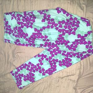 LuLaRoe One Size Leggings purple flowers on blue background